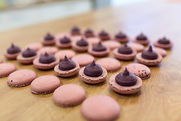 Image showing macarons on table at confectionery or bakery