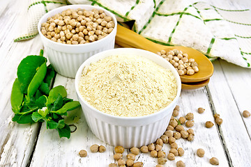 Image showing Flour chickpeas in white bowl on board