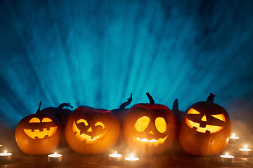 Image showing Halloween pumpkins on black