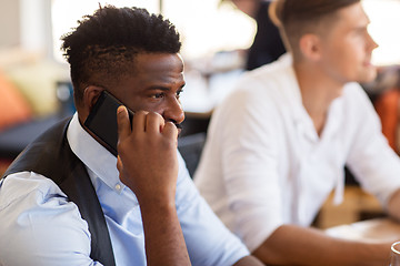 Image showing man calling on smartphone at bar or restaurant