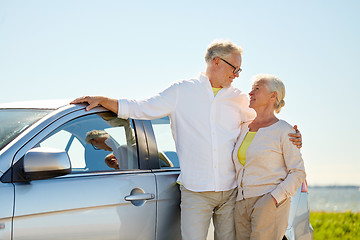 Image showing happy senior couple at car in summer