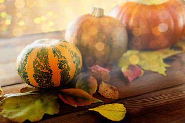 Image showing close up of pumpkins on wooden table at home