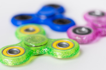 Image showing close up of fidget spinners on white background