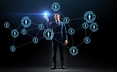 Image showing businessman with virtual network contacts