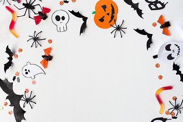 Image showing halloween party paper decorations and sweets