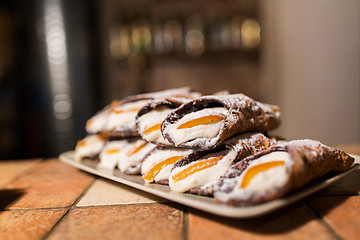 Image showing pastry on plate at bakery