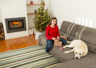 Image showing Wrapping presents for Christmas