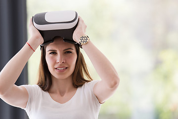 Image showing woman using VR-headset glasses of virtual reality