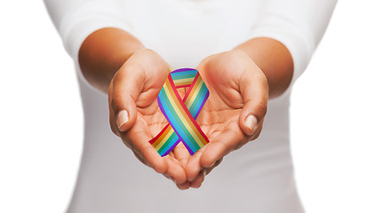 Image showing hands holding rainbow gay pride awareness ribbon