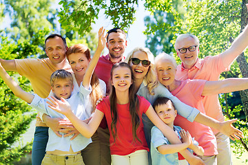 Image showing happy family portrait in summer garden