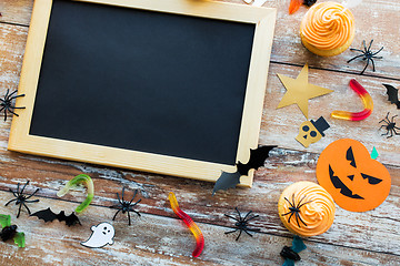 Image showing blank chalkboard and halloween party decorations