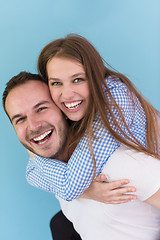 Image showing young man piggybacking his girlfriend