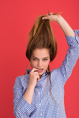 Image showing woman playing with her long silky hair