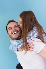 Image showing young man piggybacking his girlfriend