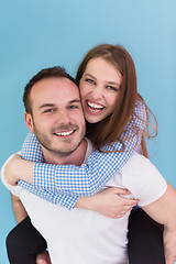 Image showing young man piggybacking his girlfriend