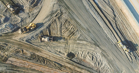 Image showing Aerial View Of Tractors On A Construction Site