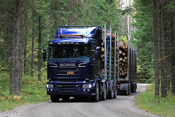 Image showing Blue Scania R730 Logging Truck in Spruce Forest