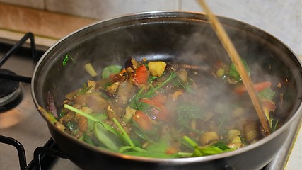 Image showing Preparing hot breakfast