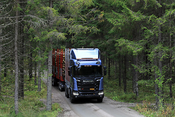 Image showing New Scania R650 XT Logging Truck on Forest Road