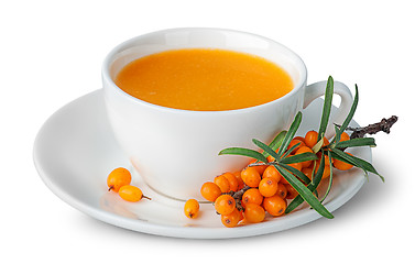 Image showing Juice from sea-buckthorn in a cup with berries