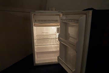 Image showing Empty refrigerator in the dark