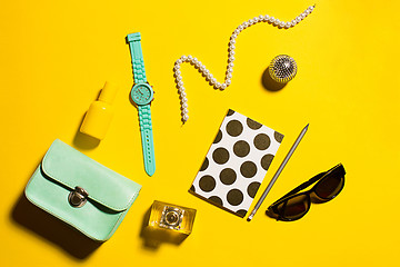 Image showing Still life of fashion woman, objects on yellow