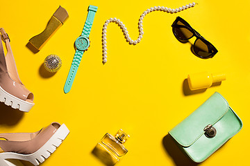 Image showing Still life of fashion woman, objects on yellow