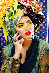 Image showing beauty bright woman with creative make up, many shawls on head l