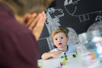 Image showing Cute little toddler boy at child therapy session.