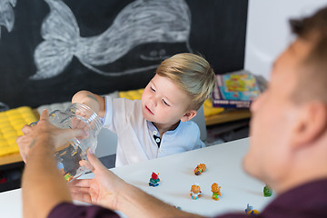 Image showing Cute little toddler boy at child therapy session.