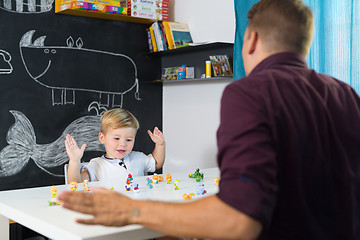 Image showing Cute little toddler boy at child therapy session.