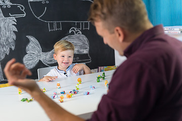 Image showing Cute little toddler boy at child therapy session.