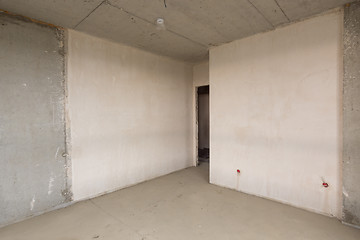 Image showing Entrance to the room in the new building, plastered and concrete walls