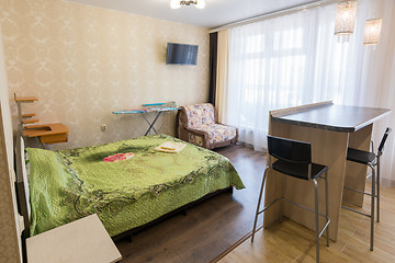 Image showing Interior of a bedroom with a sofa in a one-room apartment