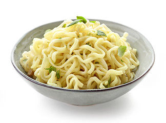 Image showing Bowl of boiled egg noodles with spices and herbs