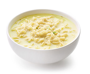 Image showing Bowl of noodle soup with cheese and herbs