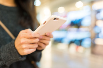 Image showing Woman touch on the cellphone