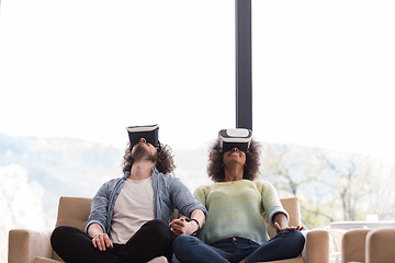 Image showing Multiethnic Couple using virtual reality headset