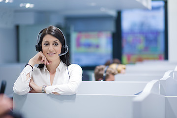 Image showing female call centre operator doing her job