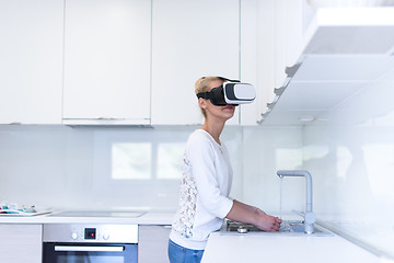 Image showing woman using VR-headset glasses of virtual reality