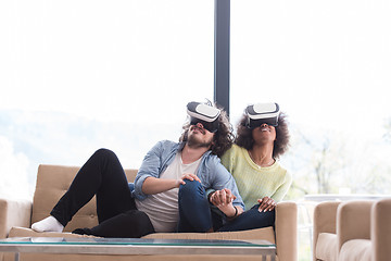 Image showing Multiethnic Couple using virtual reality headset