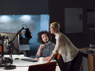 Image showing designers in the night startup office