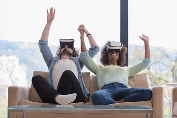 Image showing Multiethnic Couple using virtual reality headset