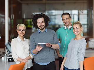 Image showing group of Business People Working With Tablet in startup office