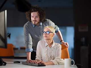 Image showing designers in the night startup office