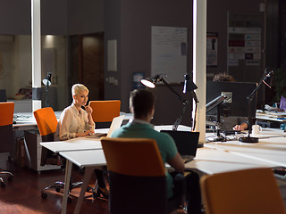 Image showing designers in the night startup office