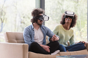 Image showing Multiethnic Couple using virtual reality headset