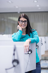 Image showing female call centre operator doing her job