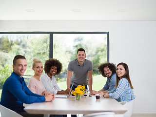 Image showing Multiethnic startup Business Team At A Meeting at modern office 