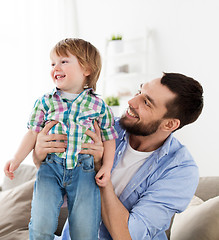 Image showing happy father with little son at home